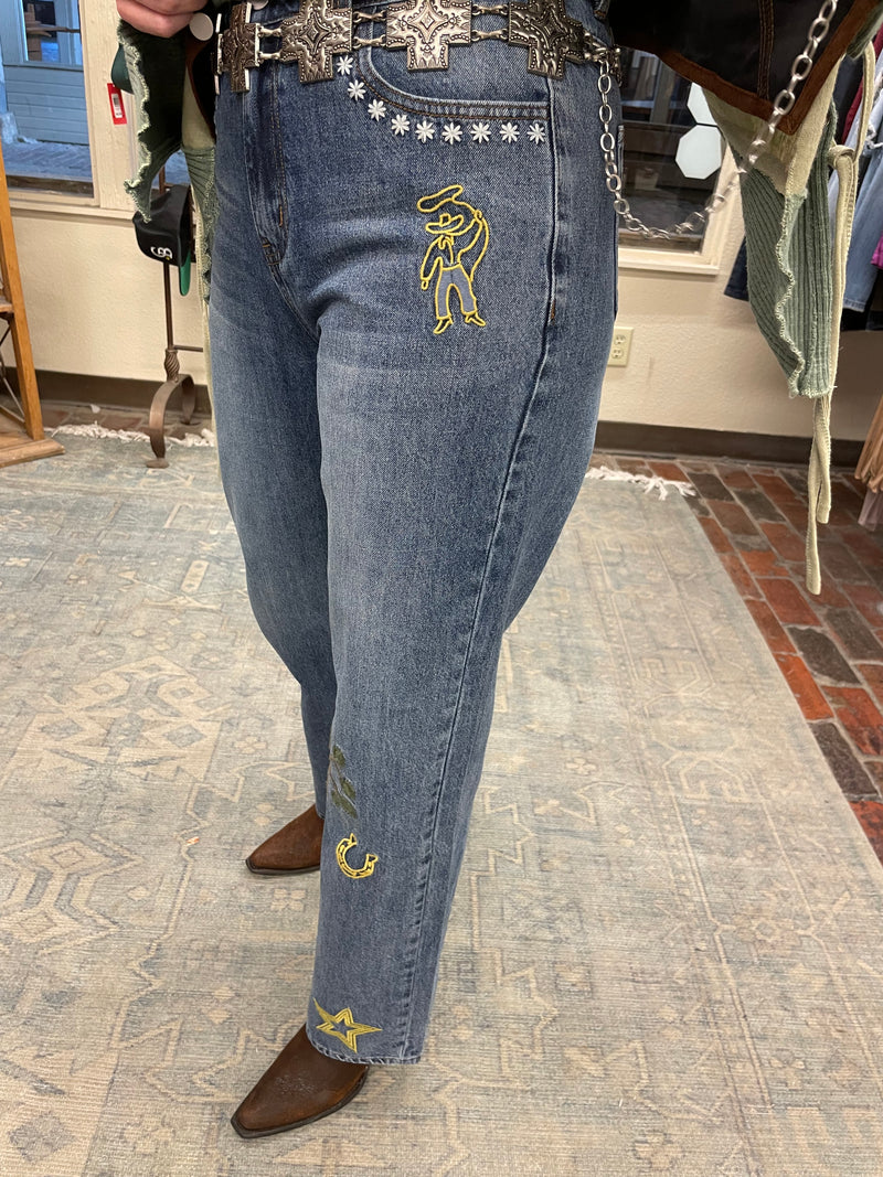 Embroidered cowboy jeans
